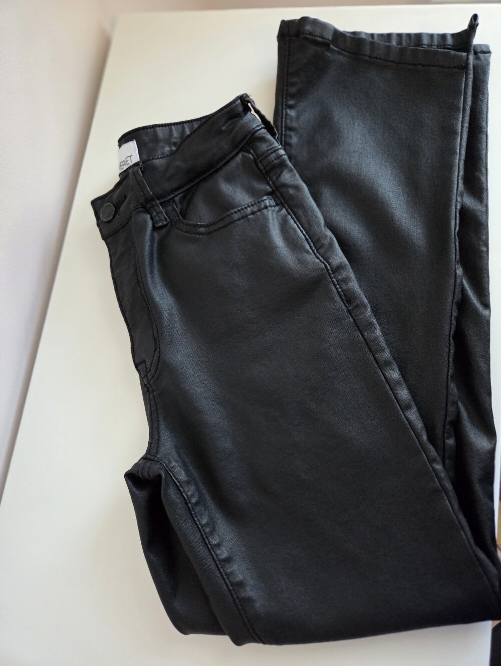 Sleek Black Skinny Coated Jeans for Women